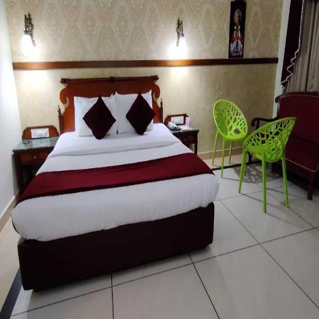 Tea County Hotel Мунар Екстериор снимка