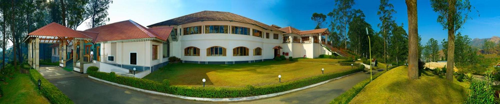 Tea County Hotel Мунар Екстериор снимка