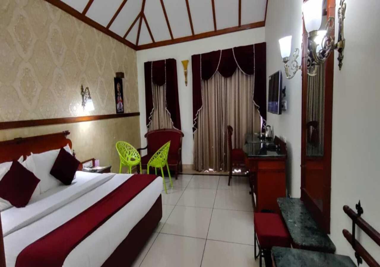 Tea County Hotel Мунар Екстериор снимка