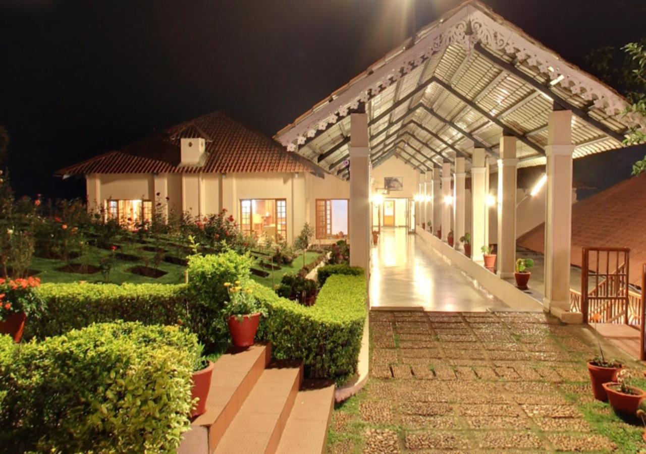Tea County Hotel Мунар Екстериор снимка