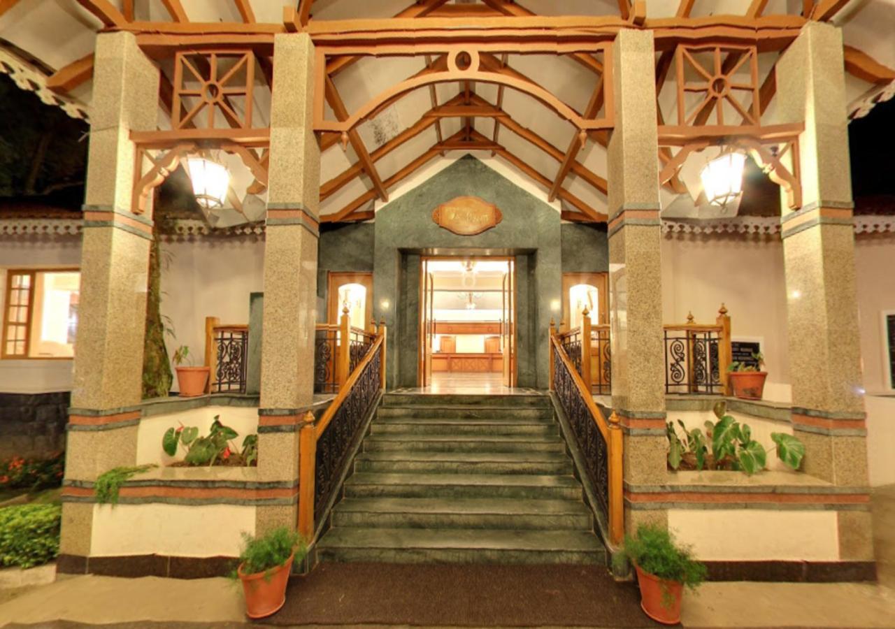 Tea County Hotel Мунар Екстериор снимка