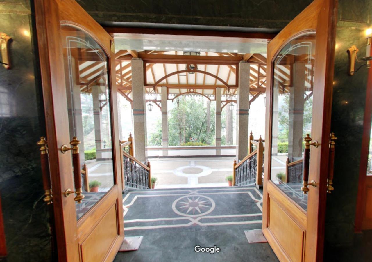 Tea County Hotel Мунар Екстериор снимка