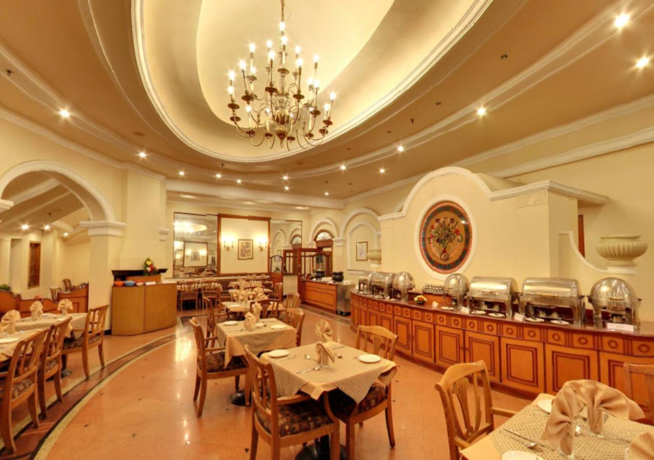 Tea County Hotel Мунар Екстериор снимка