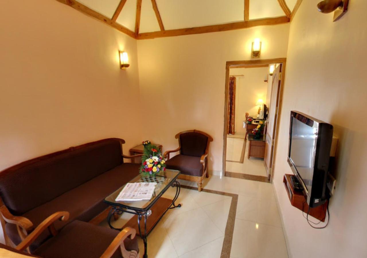 Tea County Hotel Мунар Екстериор снимка
