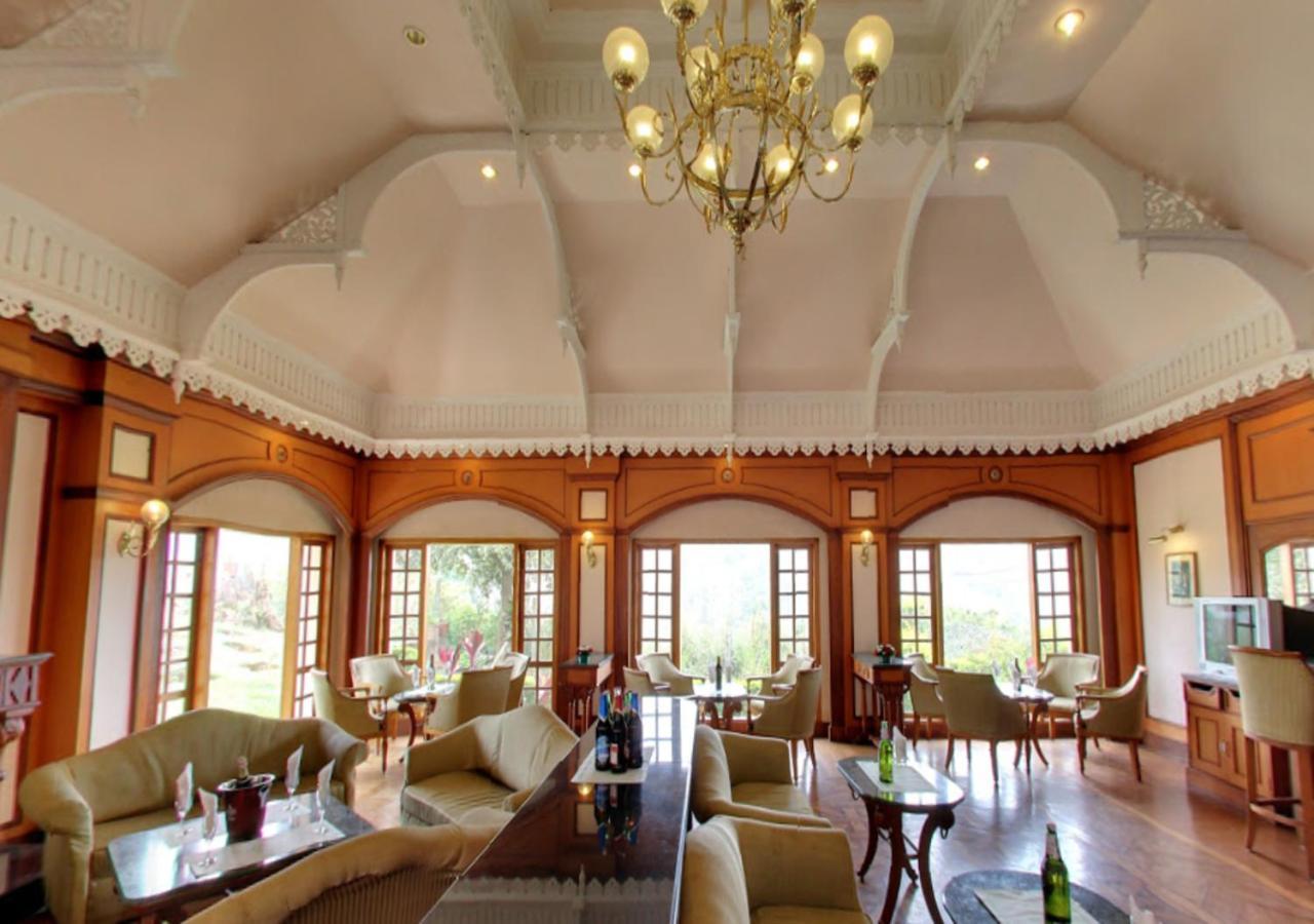 Tea County Hotel Мунар Екстериор снимка