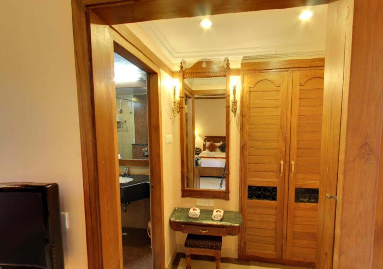 Tea County Hotel Мунар Екстериор снимка