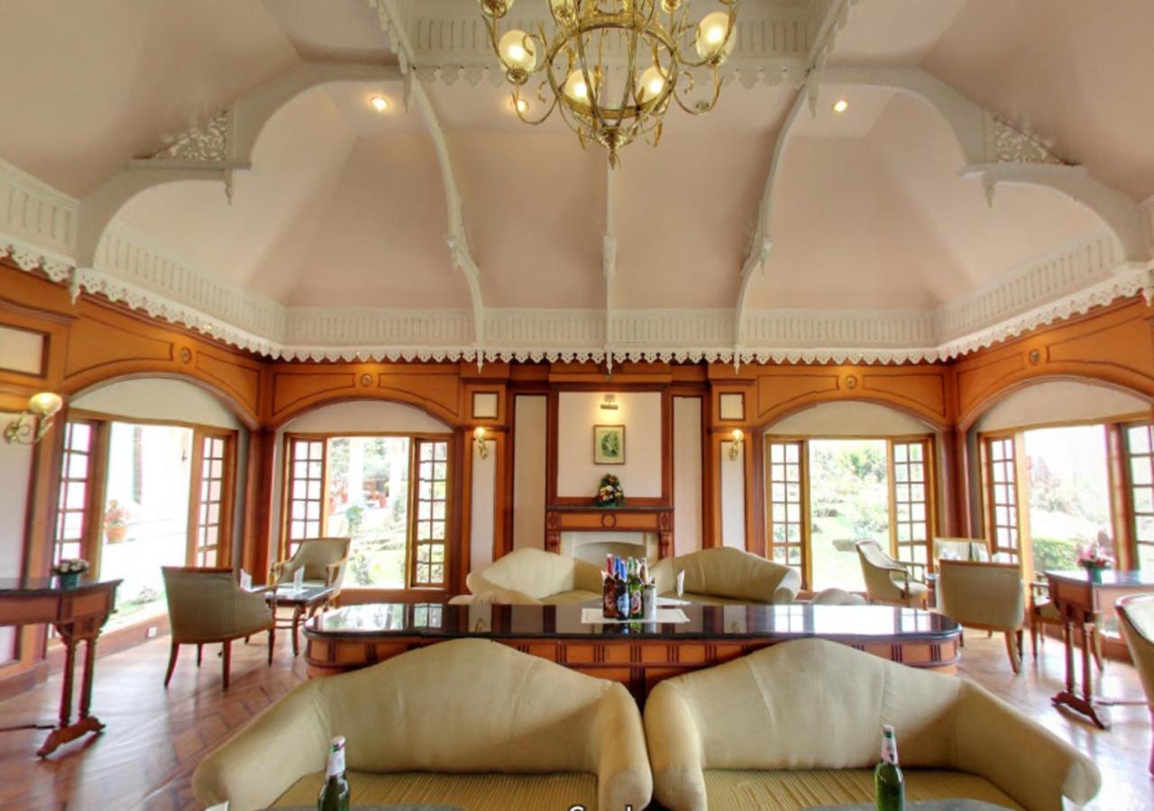 Tea County Hotel Мунар Екстериор снимка